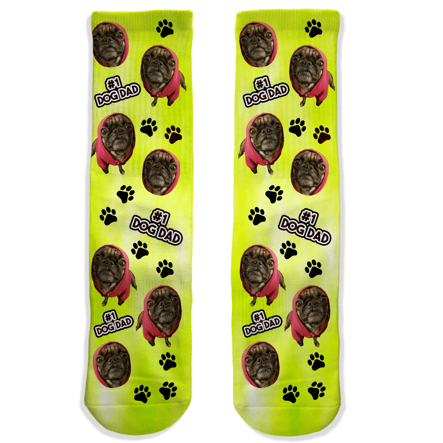 Two yellow socks with a dog's face and '1 Dog Dad' text on a white background