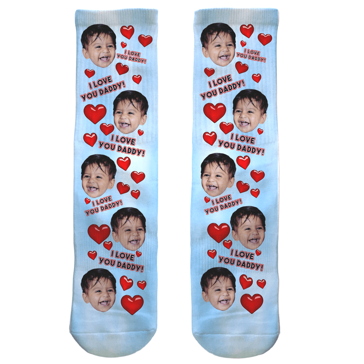 Two socks with a child's face and 'I love you daddy' text on a light blue background.