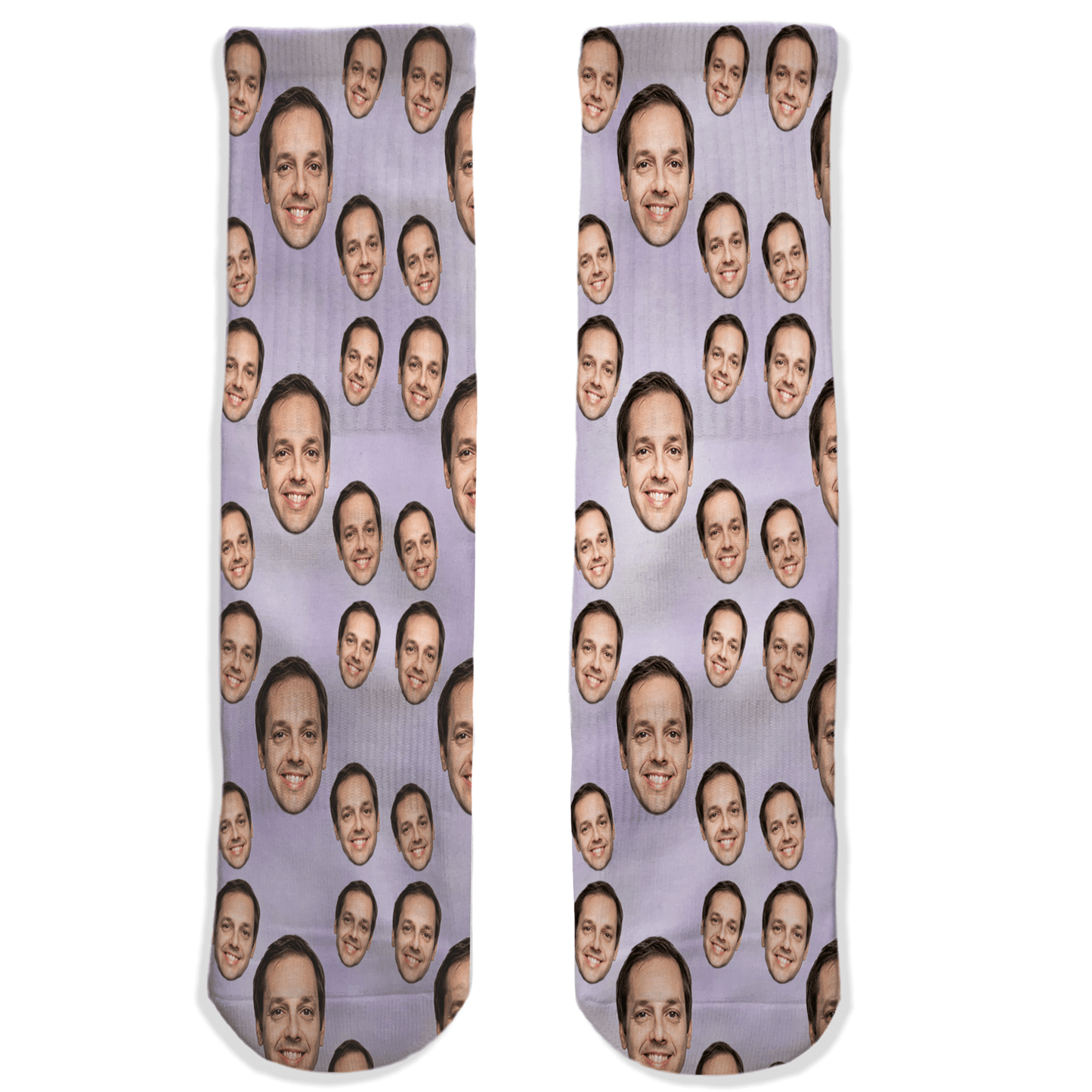 Pair of socks with a pattern of a man's face on a white background