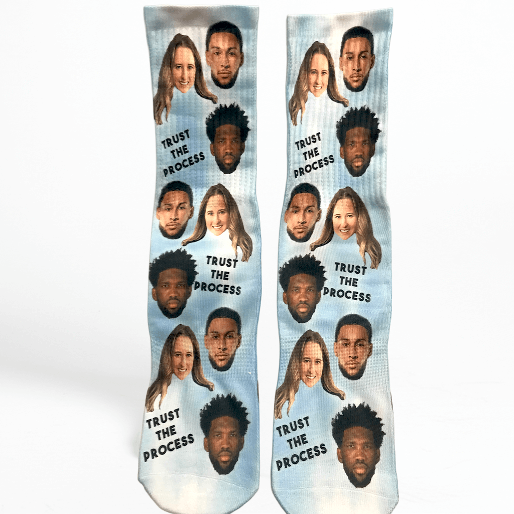 Socks with faces of people and custom message text on a white background