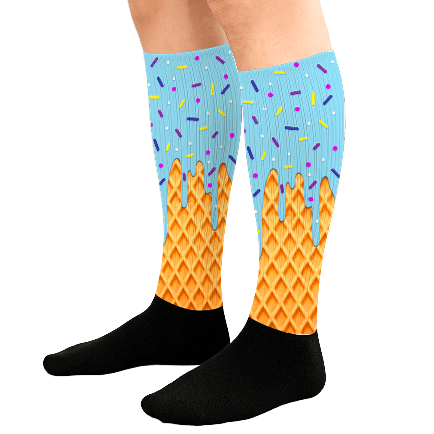 Colorful ice cream cone socks with blue sky and sprinkles design on a white background