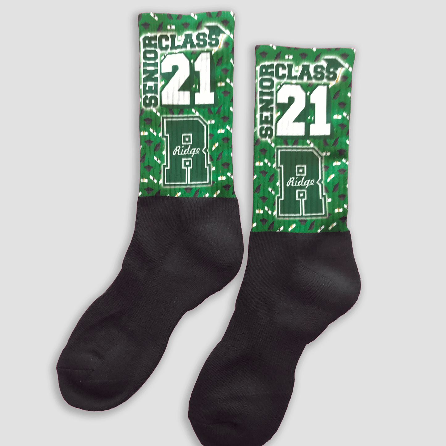 Personalized black socks with green and white school mascot design for seniors
