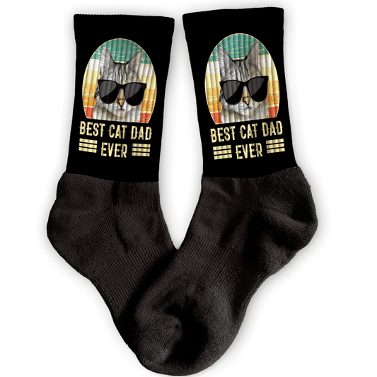 Black crew socks with a retro cat in sunglasses and “Best Cat Dad Ever” text. Fun novelty socks for cat dads and pet lovers.