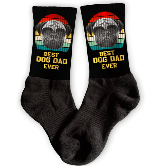 Black socks with a pug graphic and 'Best Dog Dad Ever' text on a white background