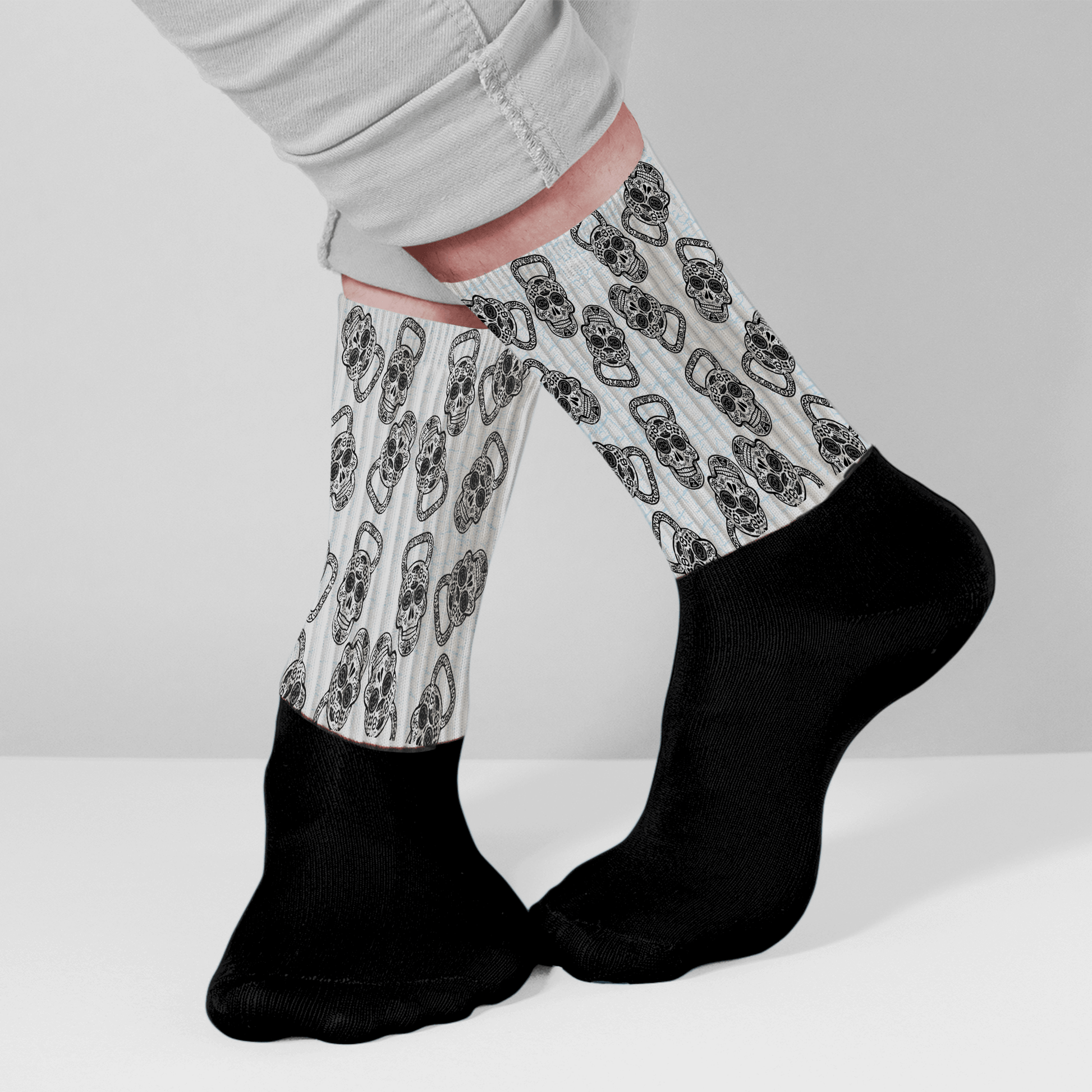 Athletic Crew socks with kettlebells shaped like skulls by Merry Mayhem Designs