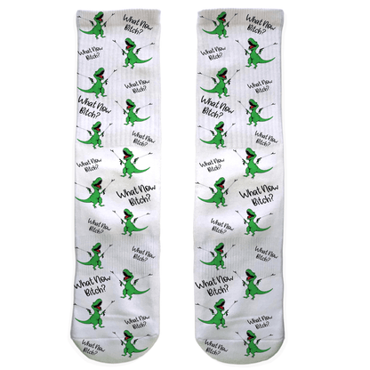 Pair of socks with green dinosaur illustrations and text on a white background