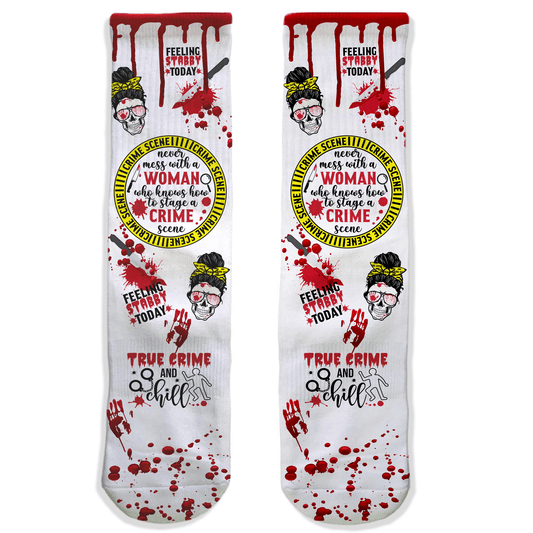 Pair of socks with a graphic design featuring text and a woman's face, on a white background.