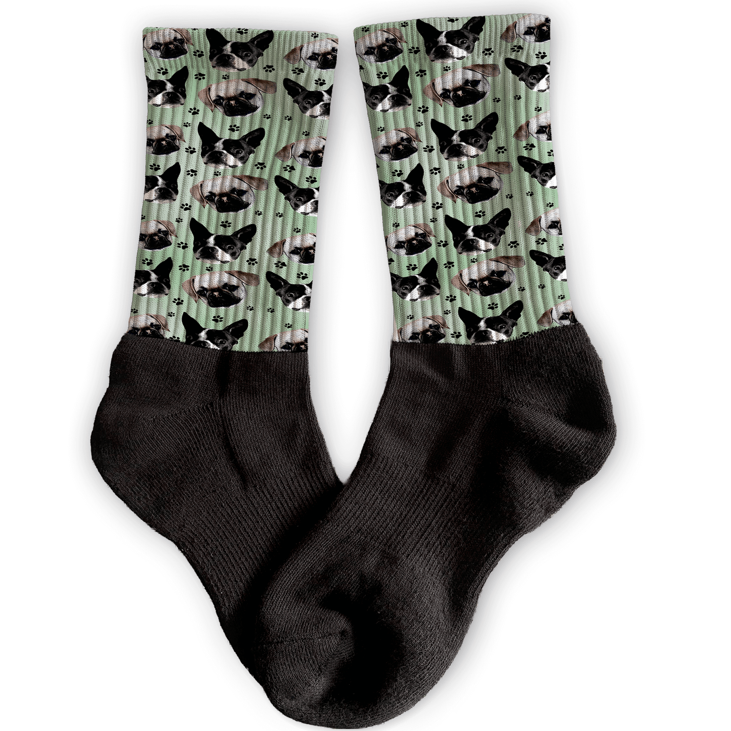 Black socks with a pattern of dogs on a green background