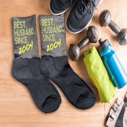 Anniversary socks customized with year in a gym setting