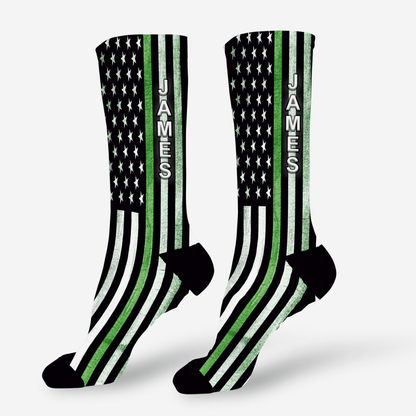 Socks with American flag design and personalized branding on a white background