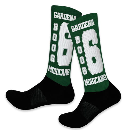 Custom green and white knee-high sports socks with team name, mascot, and player number.
