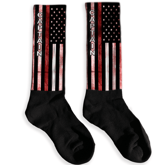 Personalized firefighter knee high socks with red line flag and custom name.