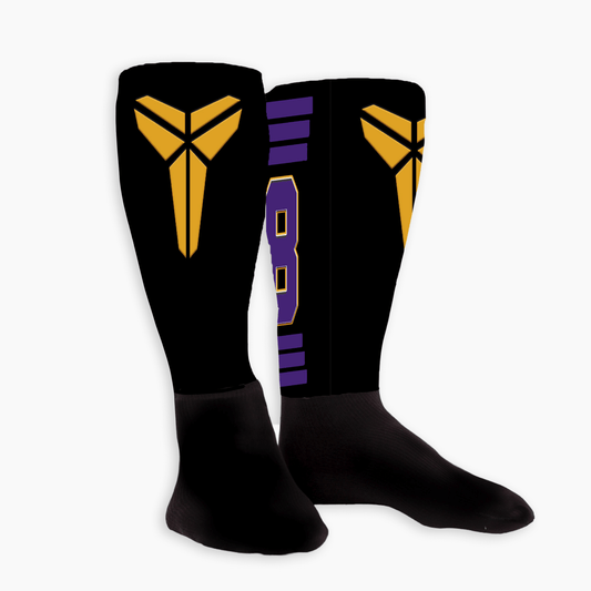 Custom knee high socks with team logo on the front and name/number down the back. Personalized team sports socks.