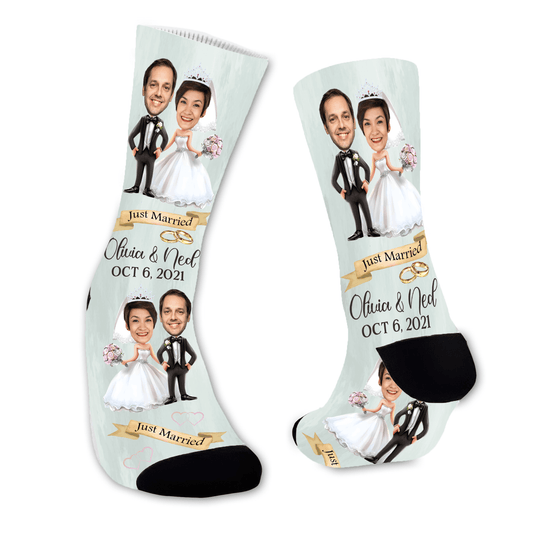 Personalized socks with caricatures of a bride and groom and wedding details.