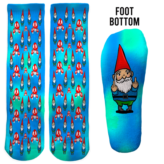 Blue crew socks with red-capped gnome and mushrooms, gnome flipping off on foot bottom. Naughty novelty gift for office or white elephant.