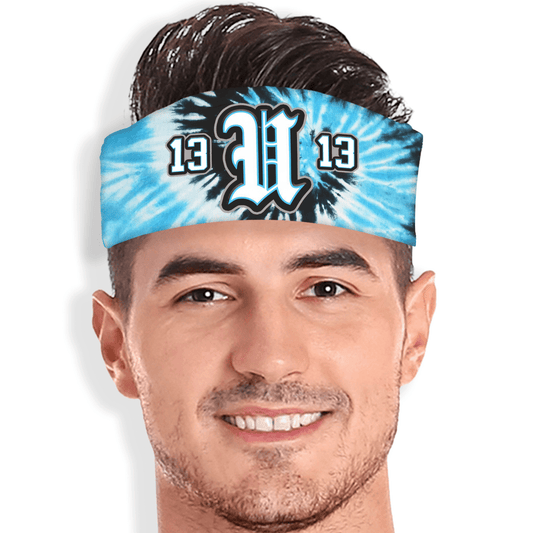 Tie-dye skull wrap in blue and black with custom team letter and number. Personalized headband for sports and spirit.