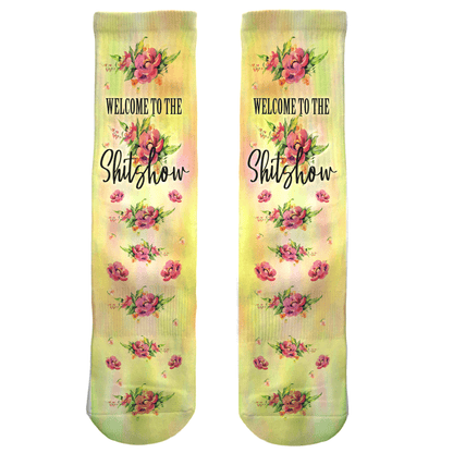 Welcome to the Shitshow floral socks—funny yellow crew socks with pink flowers, sarcastic novelty gift for adults, birthdays, and parties.